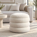 Flukinora Cream Pouf With Storage product view showing textured upholstery in a clean, contemporary living room setting.