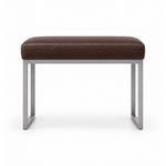 Bencivola Pedicure Footrest pairs a brown leather top with rectangular metal end supports and stitched cushion edges.