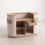 Additional view of Nolmeny Fluted Salon Reception Desk, showing curved edges with the finish and form clearly visible.