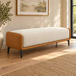 Close-up of Selovy Cream Upholstered Bench, highlighting cream cushion and caramel curved sides in a modern home setting.