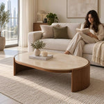 Close-up of Unkano Travertine Oval Coffee Table, highlighting elongated oval tabletop for a modern living room interior.