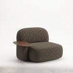 Alternate view of Aerovy Accent Chair, showing integrated side table and generously cushioned seat in a modern home setting.