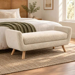 Albito Cream Bouclé Upholstered Bench featuring textured bouclé upholstery and padded seat in a clear product photograph.
