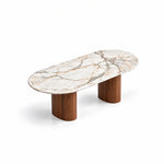 Alternate view of Arcasilora Oval Marble Coffee Table, showing elongated oval top and rounded edges in a modern home setting.