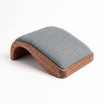 Archara Light Grey Manicure Hand Rest featuring padded hand support in a clear product photograph in a modern home setting.