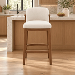 Arrosity Upholstered Wooden Bar Stool featuring thick cushioned seat in a clear product photograph in a modern home setting.