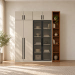 Balomora Wooden Wardrobe with Glass Storage Cabinet pairs long black handles with upper cupboards against a bedroom wall.