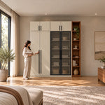 Balomora Wooden Wardrobe with Glass Storage Cabinet with a woman at the front of the wardrobe, featuring upper cupboards.