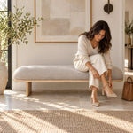 Close-up of Calmovy Beige Upholstered Bench, highlighting soft cushioned seat in a clean, contemporary entryway setting.