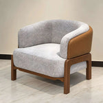 Covondra Grey Accent Chair with Wooden Frame product photo showing curved wraparound backrest in a clean studio setting.