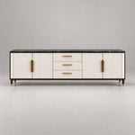 Crimpedy Black Marble Top TV Unit featuring gold-tone handles alongside enclosed side cupboards against a grey backdrop.