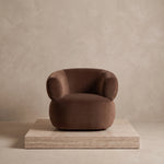 Curvera Brown Pedicure Chair product photo showing plush cushioned seat and rounded armrests in a clean studio setting.
