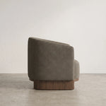 Curvinora Upholstered Accent Chair product view showing plush cushioned seat, curved backrest, and integrated armrests.