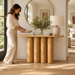 Alternate angle of Derveno Wooden Console Table, showing four-pillar base in a clean, contemporary entryway setting.