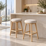 Digolna Wooden Counter Stool product view showing round cushioned seat in a clean, contemporary dining room setting.