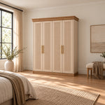 Dolbarino 4 Fluted Door Wooden Wardrobe combines a wood-look cornice with cream recessed panels against a bedroom wall.