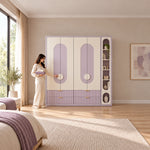 Elegitora lavender 4 Door Wardrobe with Shelves with a woman standing beside the cabinet, featuring a narrow shelf tower.
