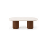 Elgenalia Marble Top 6-Seater Dining Table: two fluted cylindrical legs, a pale veined surface and a rounded marble top.