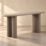 Ellirovy Wooden Console Table featuring elongated rounded tabletop and column-style legs in a clear product photograph.