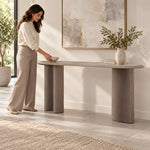 Close-up of Ellirovy Wooden Console Table, highlighting sculptural column-style legs to show the product's overall form.