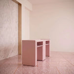 Esmiro Pink Manicure Table with Storage product view showing spacious worktop and open shelving for a modern salon interior.