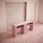 Additional view of Esmiro Pink Manicure Table with Storage, showing open shelving in a clean, contemporary salon setting.
