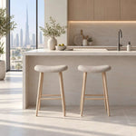 Alternate product view of Fikomira Curved Upholstered Counter Stool, featuring curved padded seat and four angled legs.
