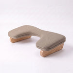Alternate view of Flooti Beige Manicure Hand Rest, showing ergonomic curved design in a clean, contemporary salon setting.