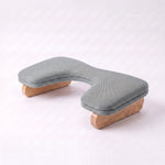 Flooti Grey Manicure Hand Rest featuring ergonomic curved design and soft cushioned top in a clear product photograph.