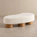 Additional view of Flussora Beige Upholstered Curved Bench, showing curved upholstered seat and flowing organic shape.