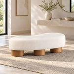 Flussora Beige Upholstered Curved Bench featuring rounded edges in a clear product photograph in a balanced home interior.