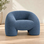 Hankeyo Blue Upholstered Accent Chair product photo showing rounded sculptural silhouette in a clean studio setting.
