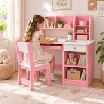 Homkona Pink Kids Study Desk with Chair: a pull-out keyboard tray beside a child seated at the table on a patterned rug.