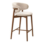Lakolini Bar Stool with Curved Backrest featuring curved upholstered backrest and padded seat in a clear product photograph.