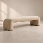 Lillypora Beige Bouclé Bench product photo showing rounded silhouette and fully upholstered design in a clean studio setting.