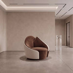 Linoria Brown & Cream Modern Pedicure Chair product photo showing curved wraparound backrest in a clean studio setting.