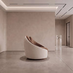 Close-up of Linoria Brown & Cream Modern Pedicure Chair, highlighting curved wraparound backrest for a modern salon interior.