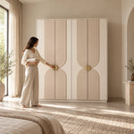 Lottomira 4 Door Wooden Wardrobe, a four-door front and curved panel detailing, beside a woman reaching toward the door.