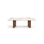 Mackilti Marble Top 6-Seater Dining Table: a long dining surface, a rectangular marble top and two fluted panel legs.