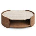 Alternate view of Miromona Travertine Round Coffee Table, showing round top and curved wood frame in a modern home setting.