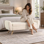 Close-up of Modenora Cream Upholstered Bench, highlighting cushioned seat in a clean, contemporary entryway setting.
