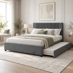 Morubby Charcoal Grey Kids Trundle Bed, with short dark feet and a vertical-channel headboard beside a bedroom window.