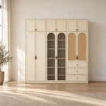 Mossylora Wardrobe with Storage Cabinet featuring three lower drawers alongside upper cupboards beside a bedroom window.