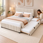 Movcopper Ivory Kids Trundle Bed, small dark feet and a matching padded frame, with bedding being arranged on the trundle.