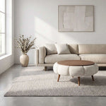 Close-up of Octopump Round Upholstered Wooden Coffee Table, highlighting round design for a modern living room interior.