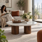 Orramina White Marble Coffee Table product view showing round top, white marble-look surface, and two pedestal bases.