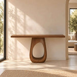 Close-up of Ovileena Wooden Console Table, highlighting loop-shaped base in a clean, contemporary entryway setting.