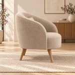 Close-up of Polomiso Beige Curved Accent Chair, highlighting curved integrated armrests for a modern living room interior.