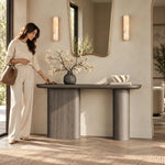 Pulanira Wooden Console Table product view showing rounded tabletop and twin pedestal legs for a modern entryway interior.