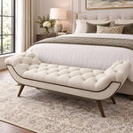 Punari Cream Upholstered Bench product photo showing deep button tufting and raised curved ends in a clean studio setting.